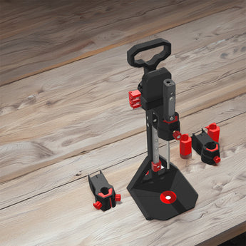Rendered Stealth Press Zero heat-set insert press with black and red printed parts, vertical rail, base plate, and soldering iron mounts.