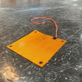 Orange LH Stinger 200mm polyimide flex PCB bed heater with red pre-soldered leads and mounting holes