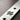 Close-up of brushed titanium Voron gantry backer plate with Lightweight Labware cutout and screw holes