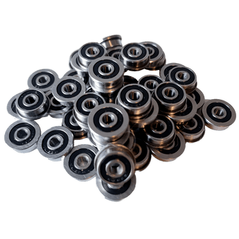 Pile of F623-2RS flanged miniature ball bearings with black rubber seals for 3mm shafts