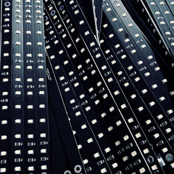 Black Daylight on a Stick 24V Voron LED bar PCBs with rows of white LEDs and resistors