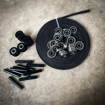 Zero G Mercury One.1 motion kit with coiled Gates 2GT belt, black Runice pulleys, F695 bearings, and black 7075 pins