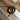 Black 2mm round sponge cord coiled on a wood surface, supplied as a 1m seal length