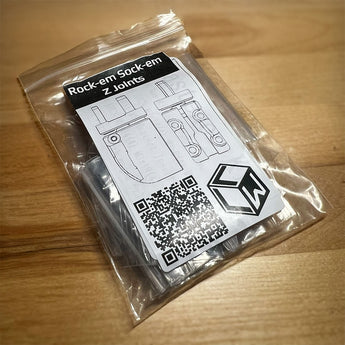 Packaged Rock-em Sock-em Z Joints kit by Lightweight Labware with labeled bag, printed joint diagrams, and QR code