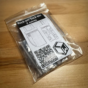 Packaged Rock-em Sock-em Z Joints kit by Lightweight Labware with labeled bag, printed joint diagrams, and QR code