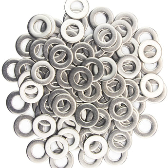 Close-up of silver metal shim washers with flat ring profile