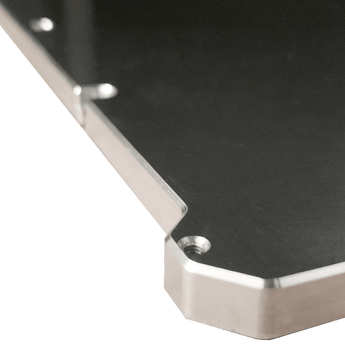 Close-up of Lightweight Labware ultra-flat aluminum bed with machined edge and mounting holes