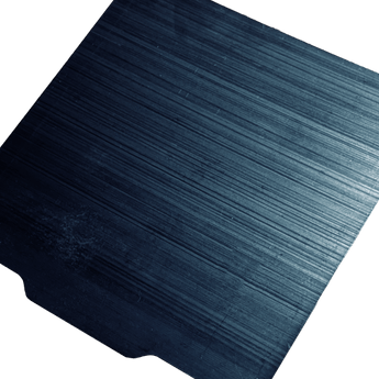 Close-up of a blank blue manganese spring steel 3D printer build sheet with dark brushed finish