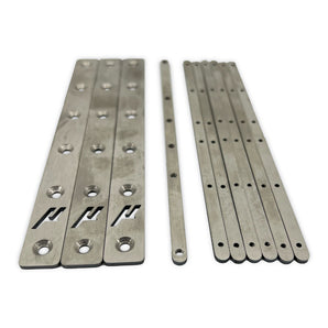 Micron 120 titanium gantry backers and threaded nut bars laid out on white background