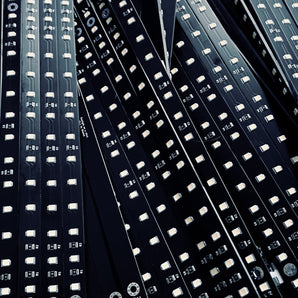 Black Daylight on a Stick 24V Voron LED bar PCBs with rows of white LEDs and resistors