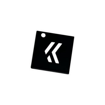 Black square steel KevinAkaSam logo keychain with cut-through logo